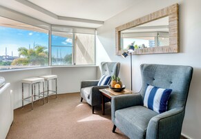 3 Bedroom Deluxe Marina View Apartment | Living area | 42-inch flat-screen TV with cable channels, TV