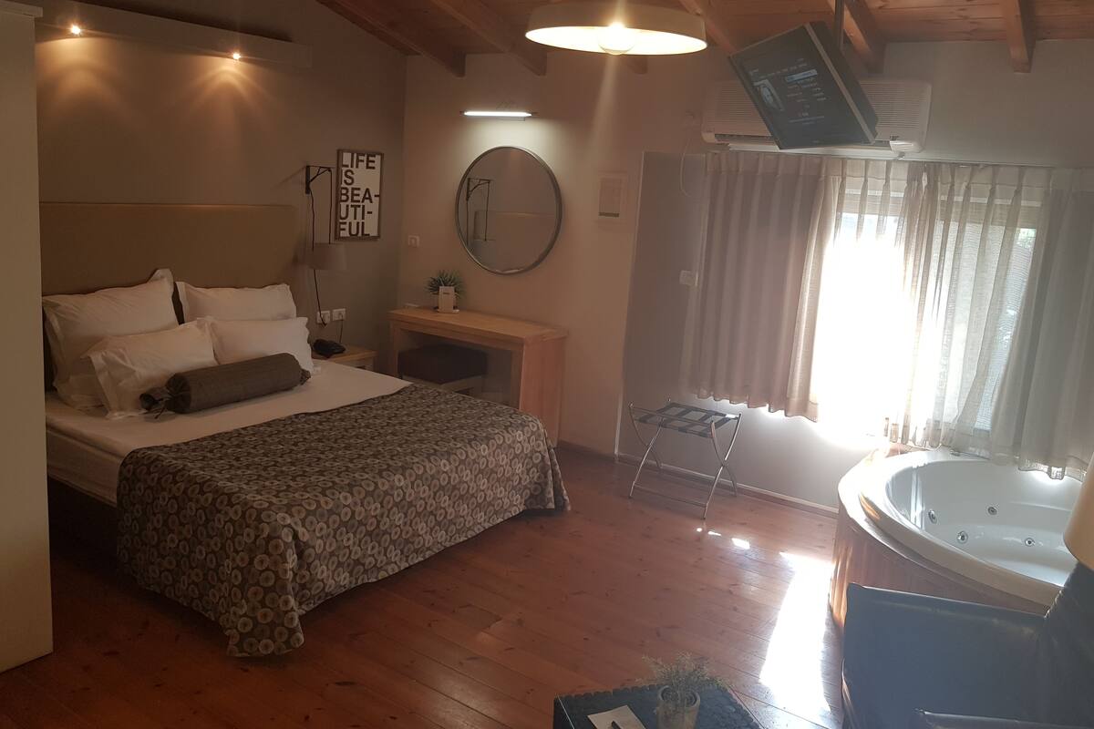 Cabin | Memory foam beds, minibar, in-room safe, blackout drapes