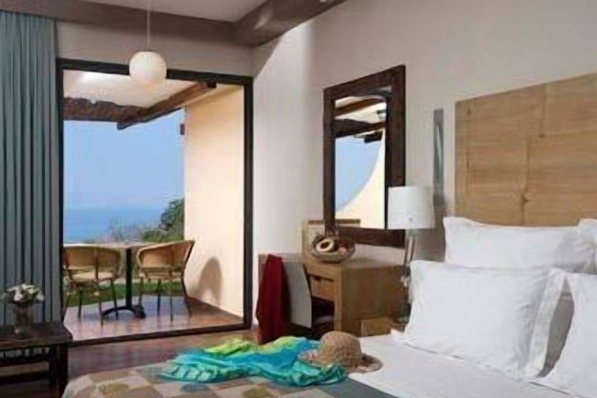 deluxe room, garden area | memory-foam beds, minibar, in-room safe, blackout curtains