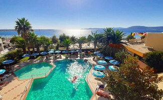 Outdoor pool, open 9:00 AM to 7:00 PM, pool umbrellas, pool loungers