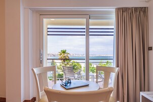 Quadruple Room, Sea View | Down comforters, minibar, in-room safe, desk