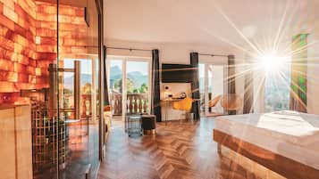 Luxury Room | Living area | 50-inch Smart TV with satellite channels, TV, tablet