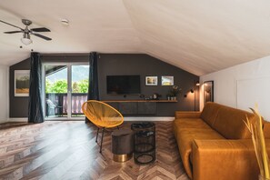 Habitación doble superior | Zona de estar | Una Smart TV, una tableta, Netflix, suelo radiante