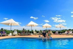 Outdoor pool, pool umbrellas, pool loungers