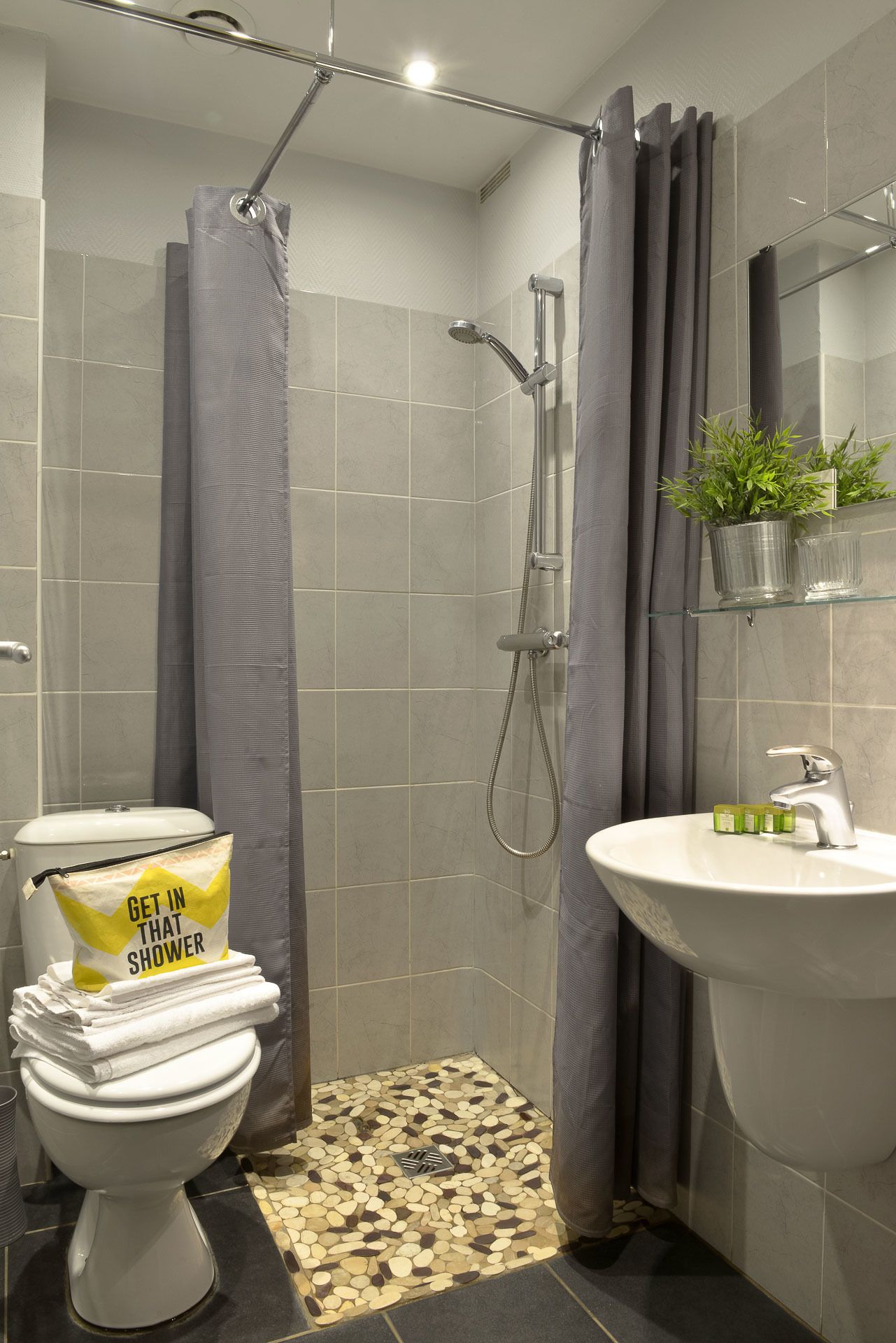 comfort single room | bathroom | hair dryer, towels, soap, shampoo