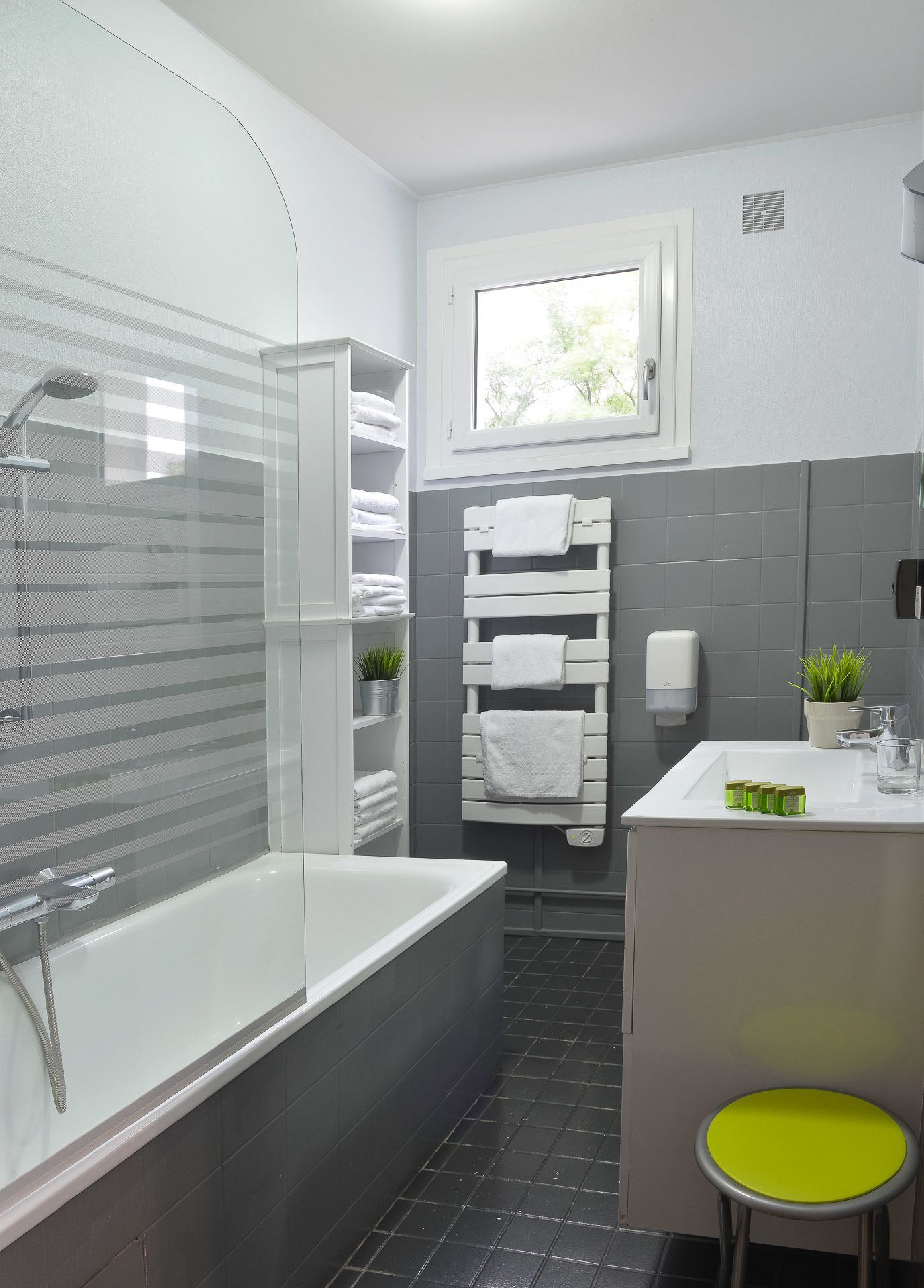 superior family room | bathroom | hair dryer, towels, soap, shampoo