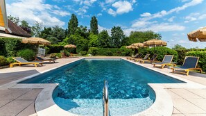 Seasonal outdoor pool, pool umbrellas, pool loungers