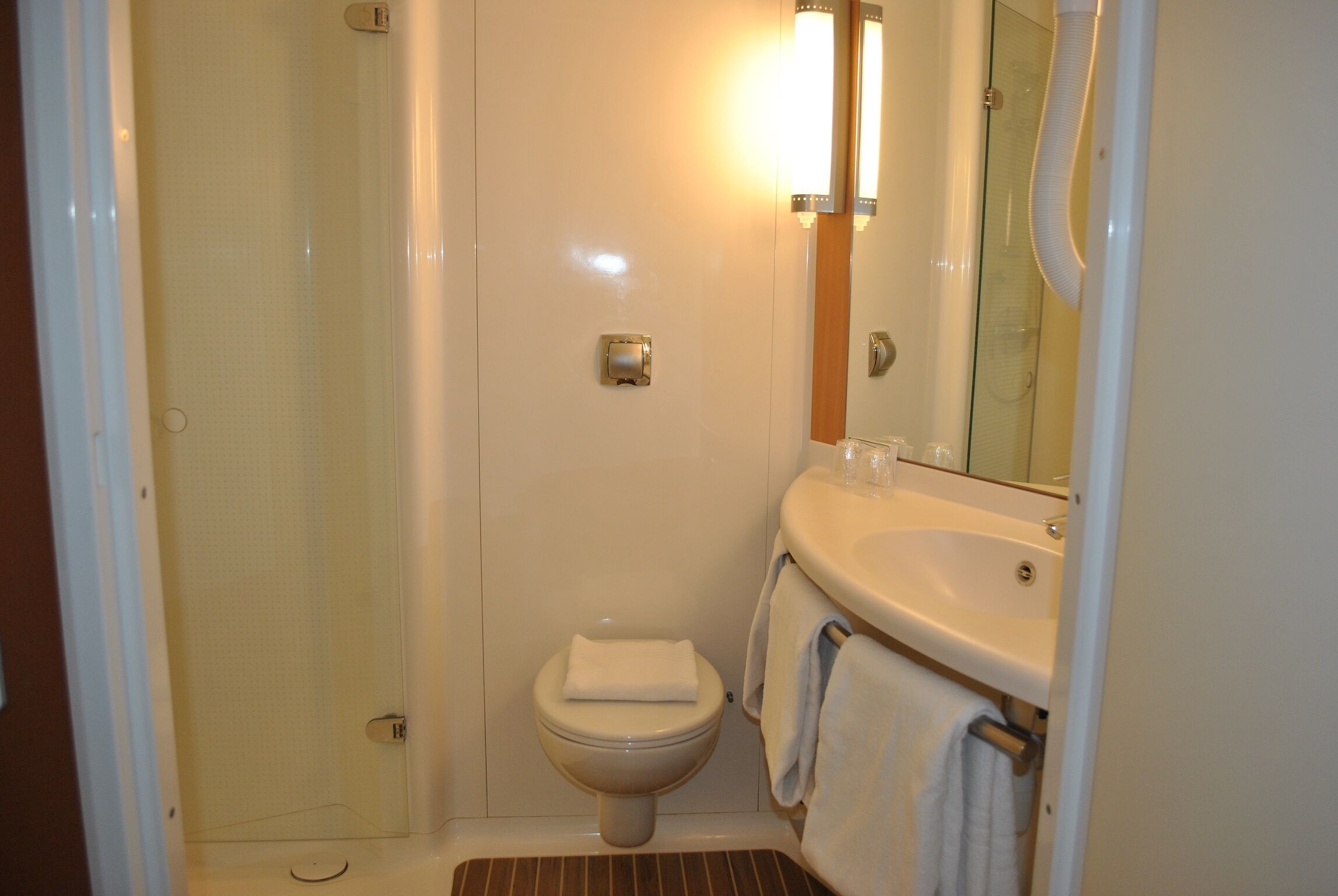 shower, eco-friendly toiletries, hair dryer, towels