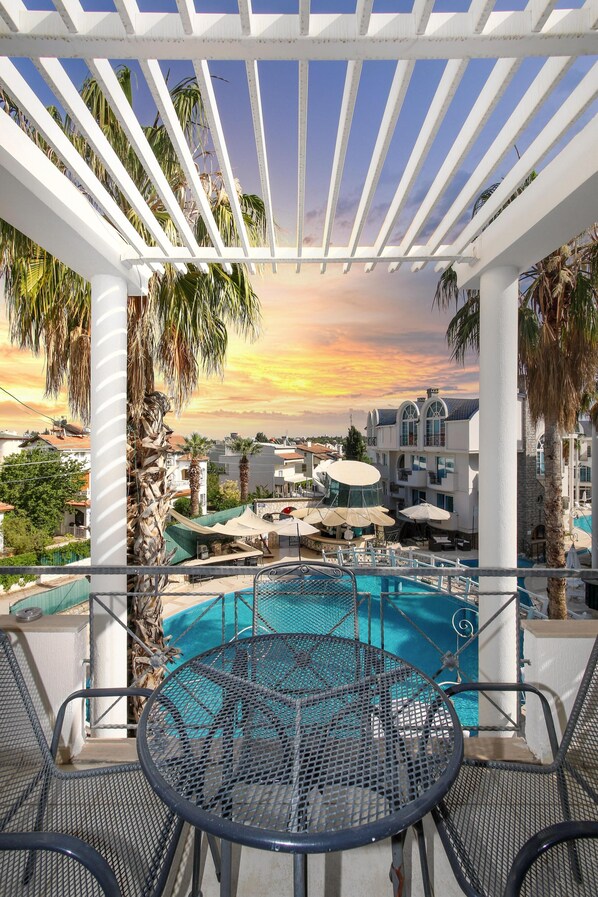 2 outdoor pools, pool umbrellas, pool loungers