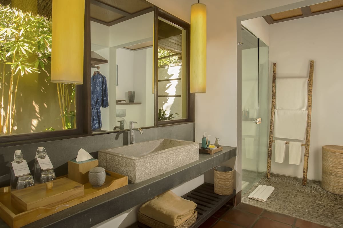 hair dryer, bathrobes, slippers, towels