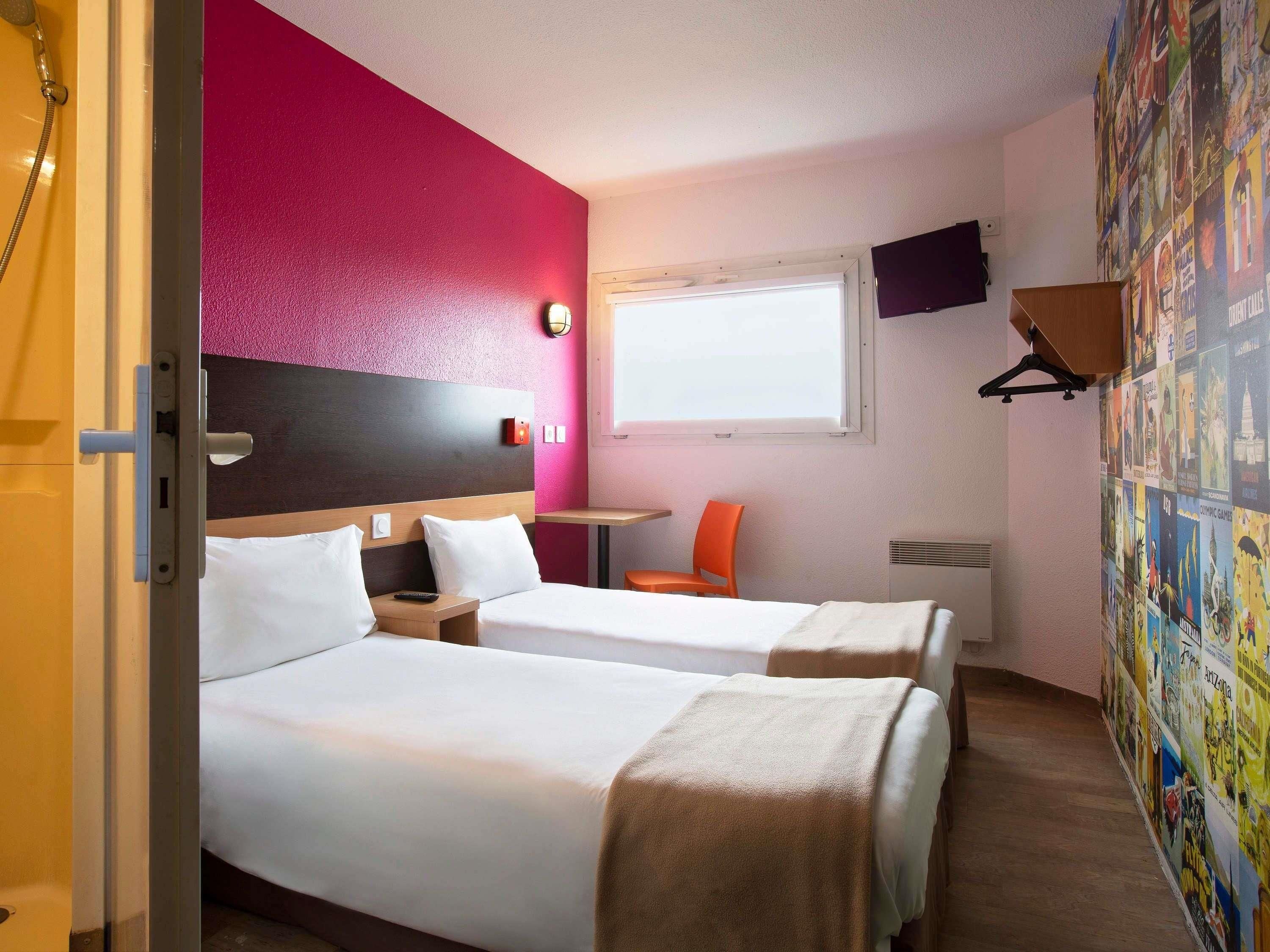 Blackout drapes, cribs (free), WiFi (free), bed sheets