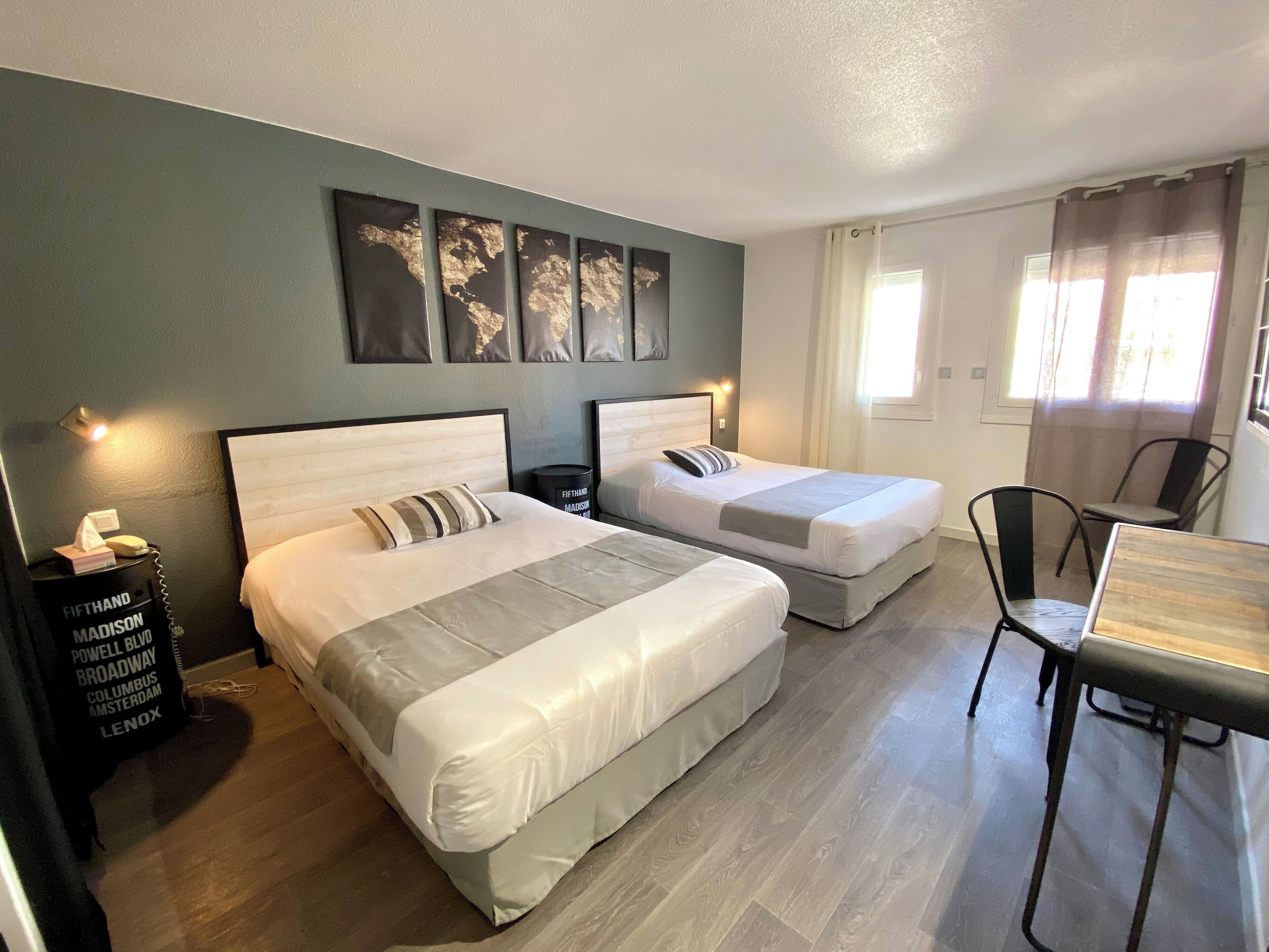 family room | premium bedding, minibar, in-room safe, desk