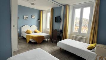 Family Quadruple Room, Garden View | Soundproofing, iron/ironing board, free cribs/infant beds, free WiFi