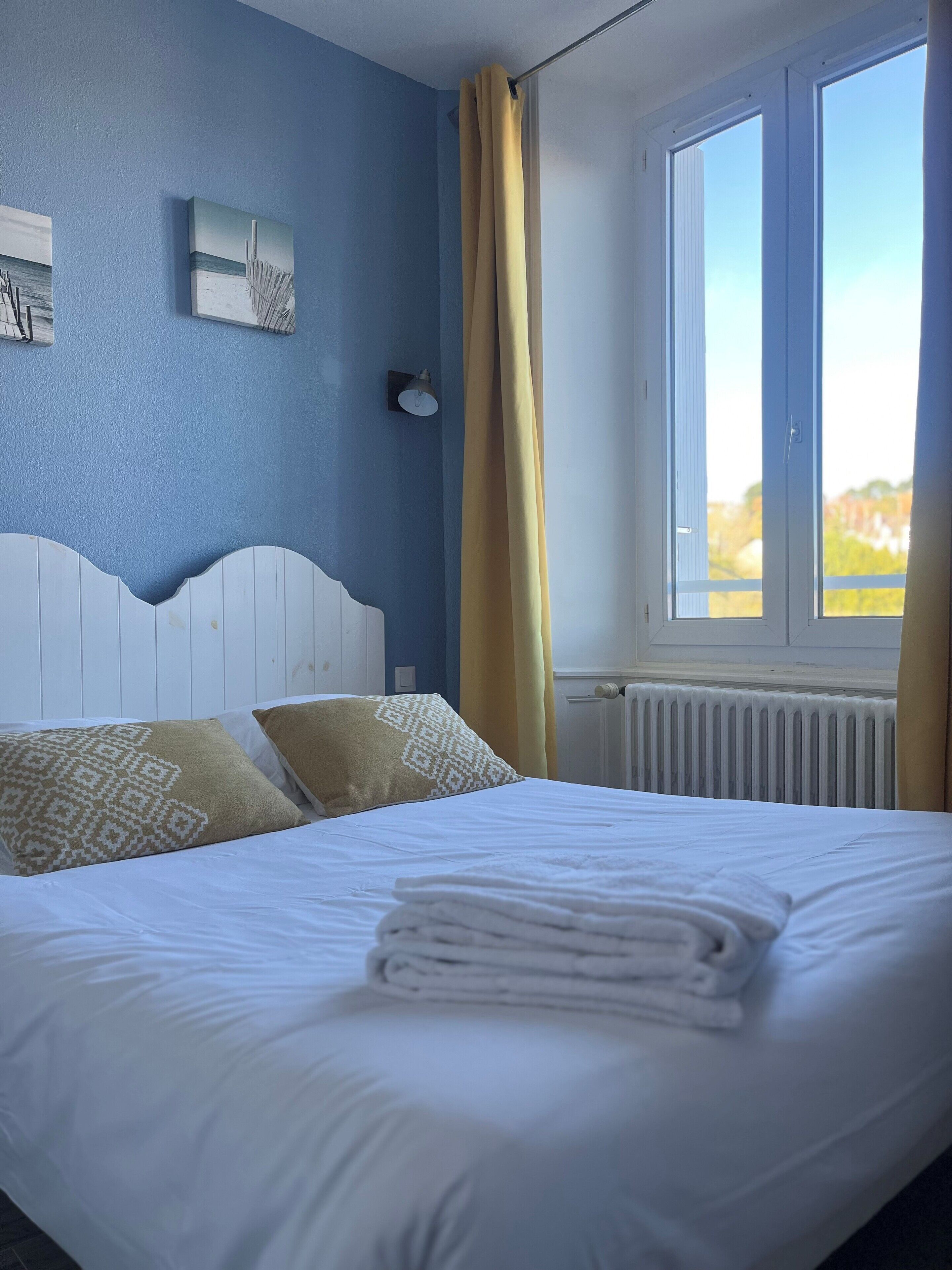 Family Quadruple Room, Garden View | Soundproofing, iron/ironing board, free cribs/infant beds, free WiFi