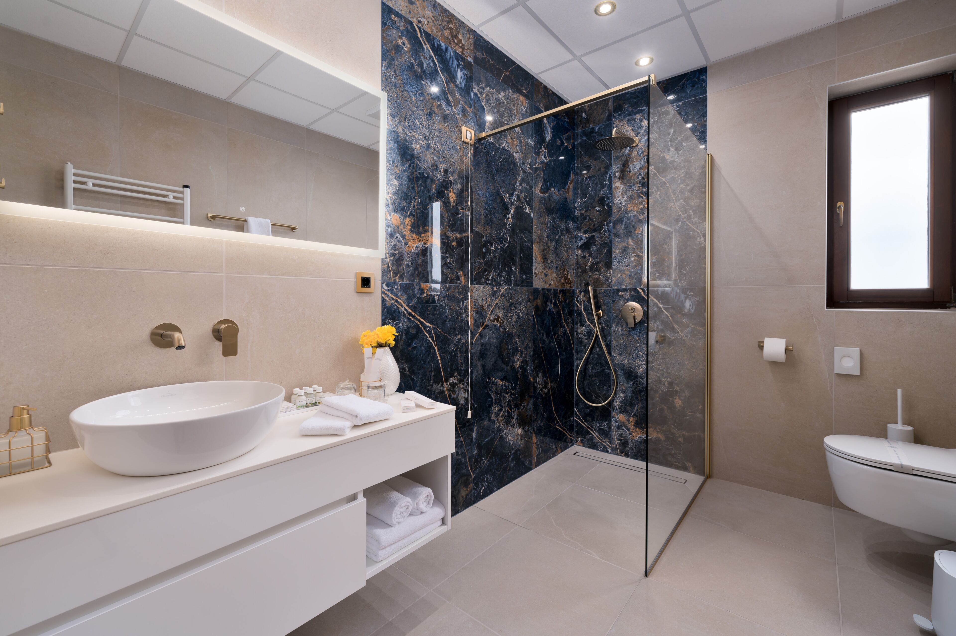 family suite, 1 king bed, balcony, sea view | bathroom | eco-friendly toiletries, hair dryer, slippers, towels