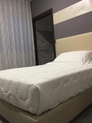 Lakens van Egyptisch katoen, luxe beddengoed, een minibar