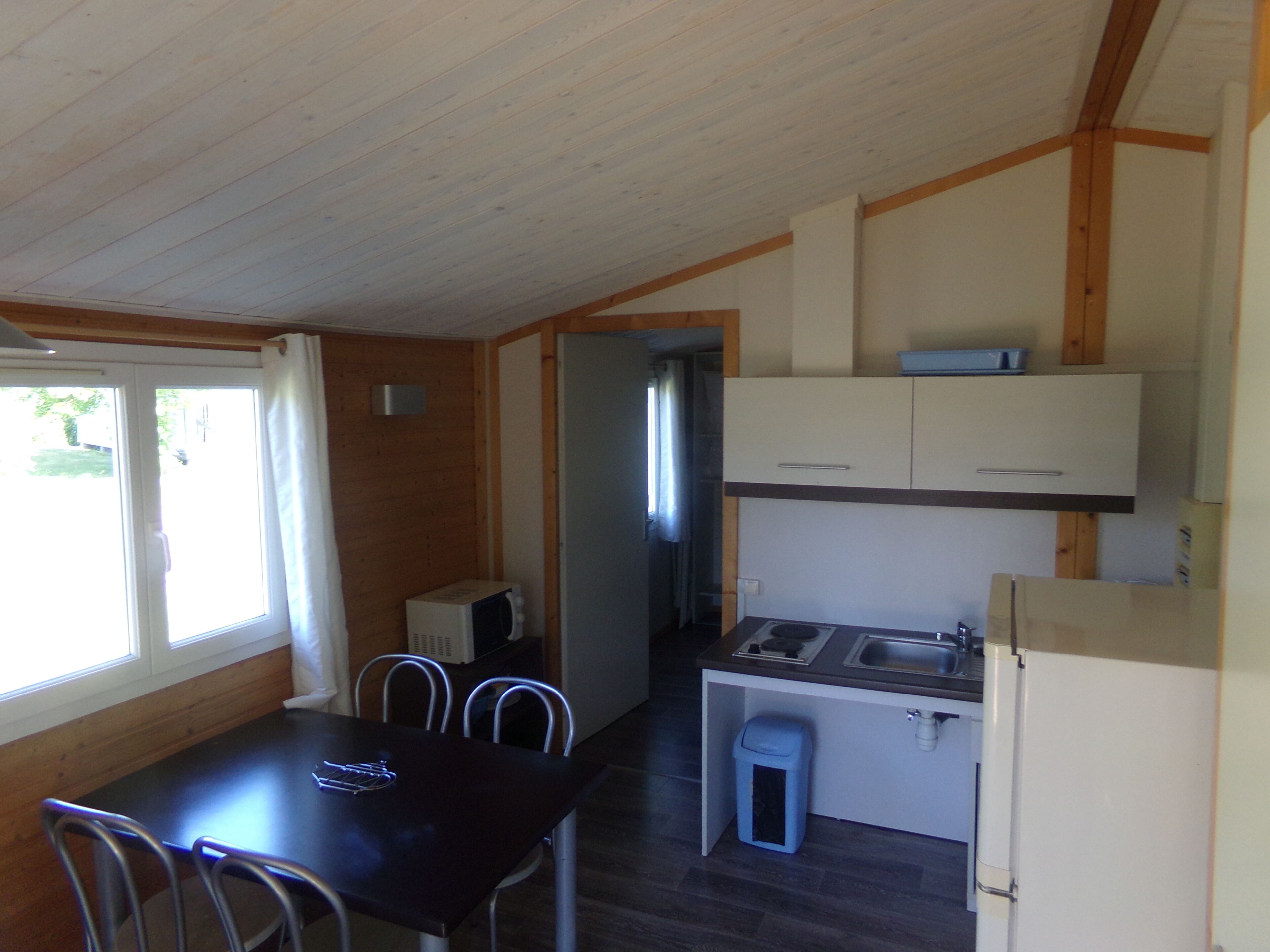 Standard Chalet, 2 Bedrooms, Mobility Accessible, Garden View | Private kitchenette | Full-sized fridge, microwave, stovetop, dishwasher