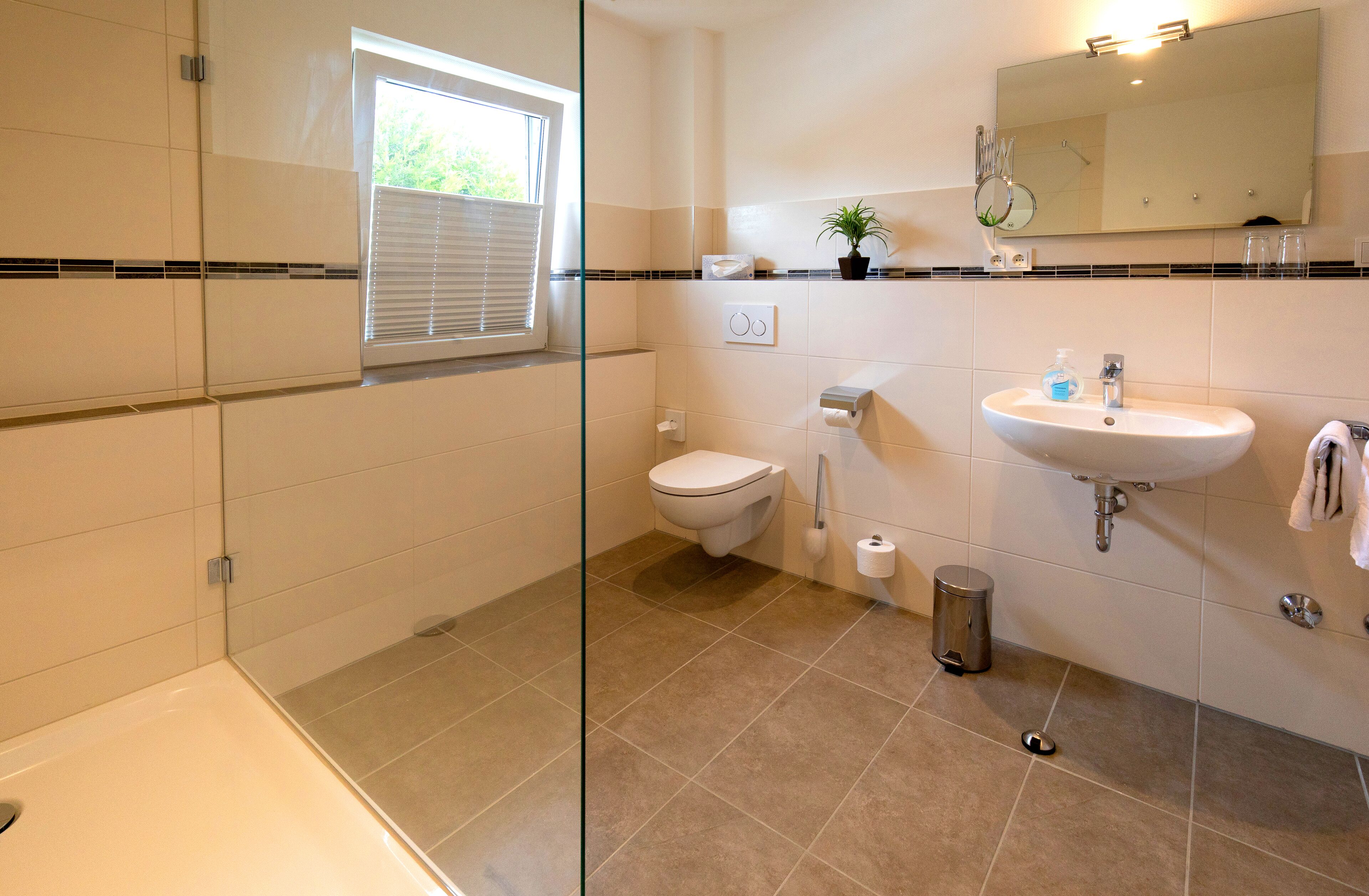 junior suite | bathroom | shower, hair dryer, bathrobes, towels