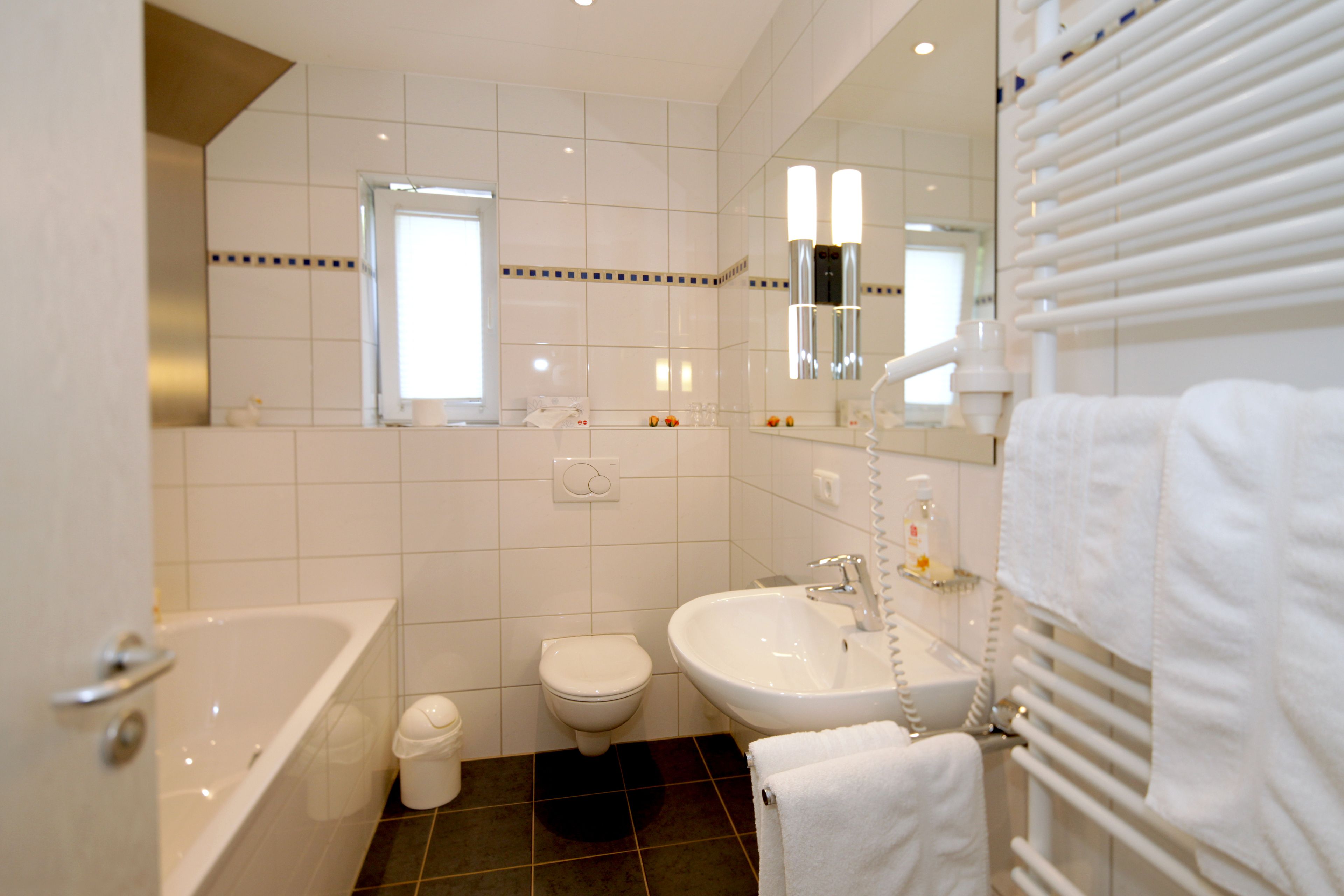 superior room | bathroom | shower, hair dryer, bathrobes, towels