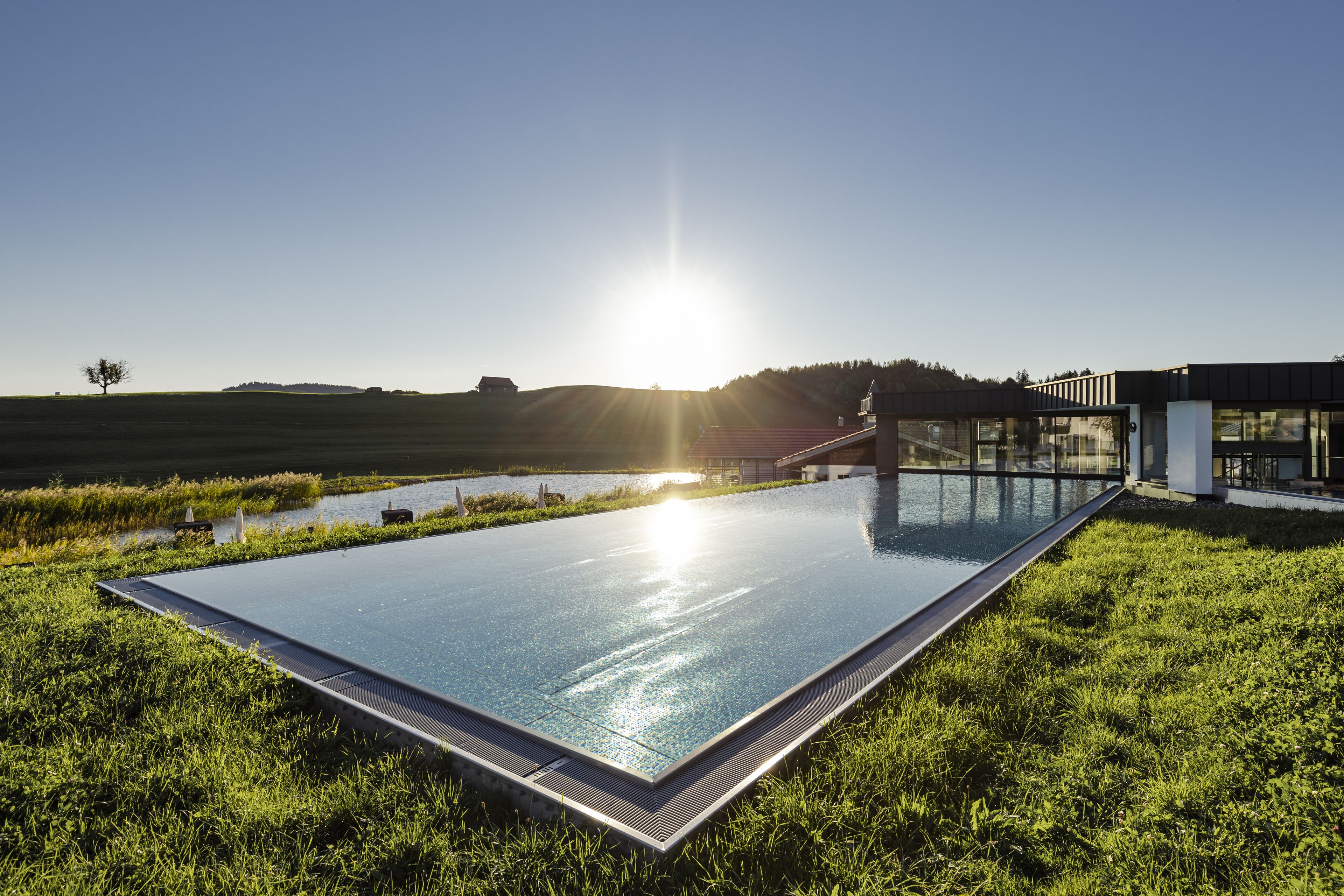 indoor pool, 2 outdoor pools, open 7:00 am to 8:00 pm, pool umbrellas