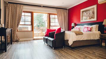 Suíte executiva | 1 quarto, roupas de cama premium, cofres nos quartos, cortinas blackout