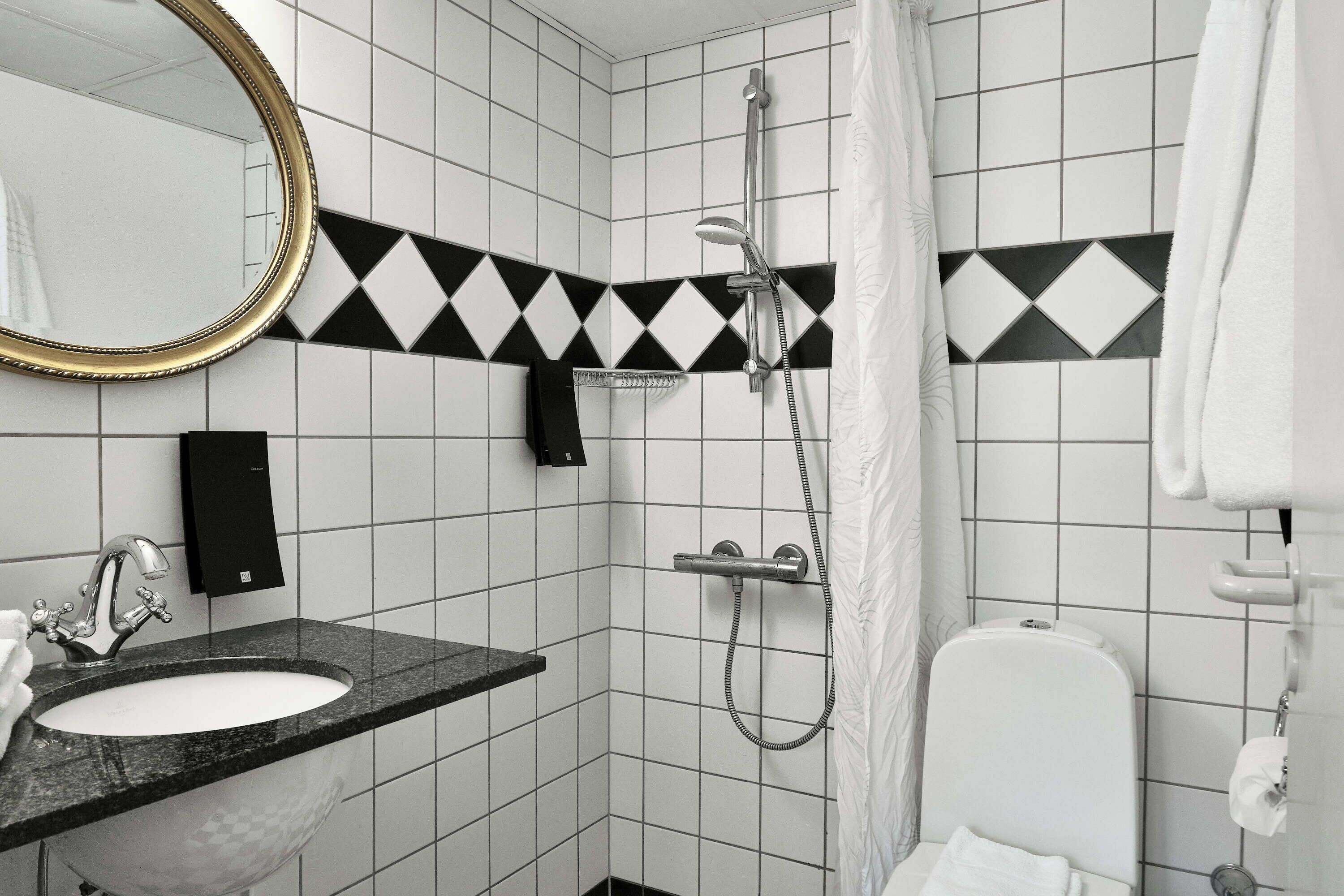 basic studio | bathroom | shower, free toiletries, hair dryer, towels