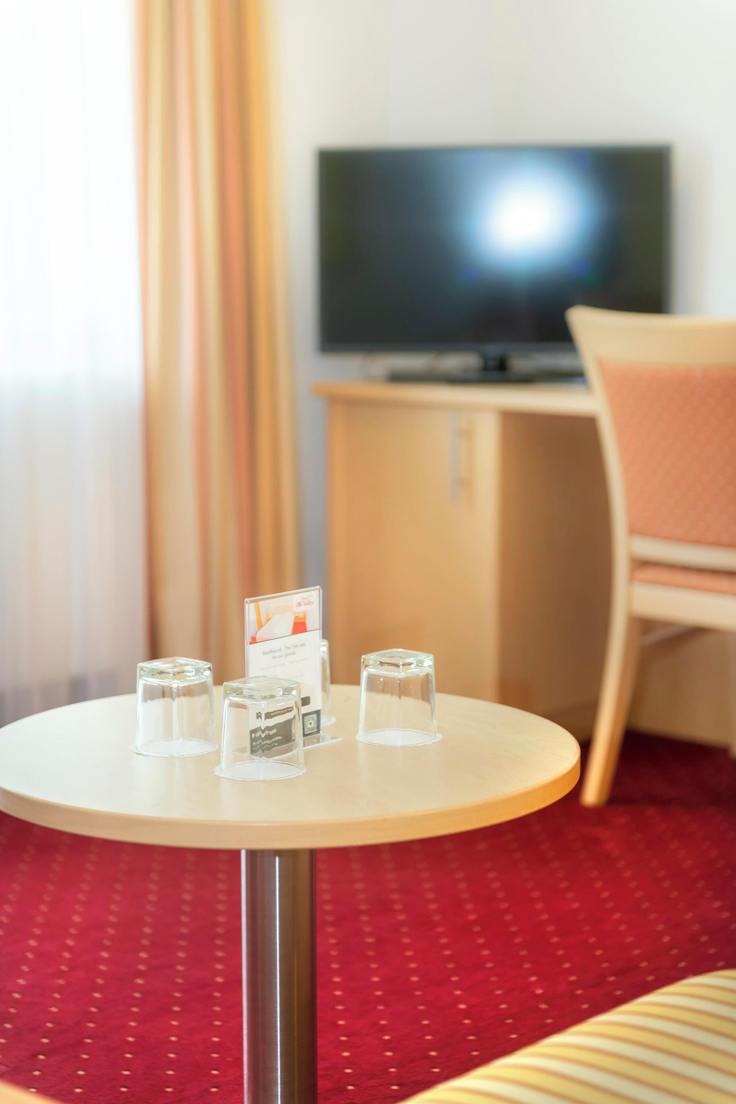 premium suite, balcony | minibar, in-room safe, individually decorated, individually furnished