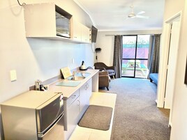 One-Bedroom Family SPA Unit (Access) | Private kitchen | Fridge, microwave, electric kettle, toaster