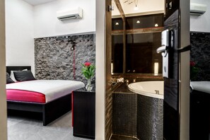 Luxury Room, Jetted Tub | Living area | TV, heated floors - Komorowski Luxury Guest Rooms (Kraków)