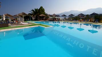 Outdoor pool, pool umbrellas, sun loungers