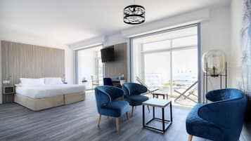 Deluxe Room, 1 Queen Bed, Non Smoking, Balcony | In-room safe, desk, free WiFi, bed sheets