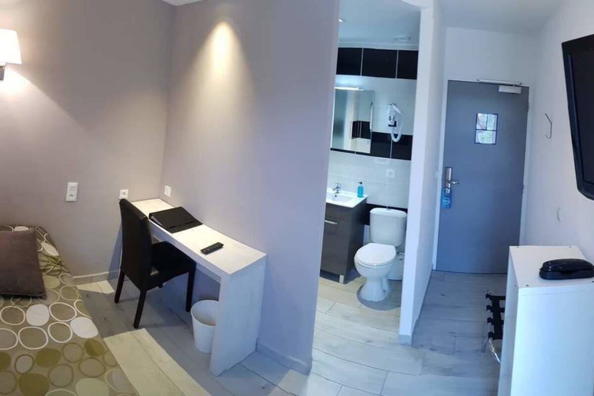 single room | premium bedding, desk, soundproofing, iron/ironing board