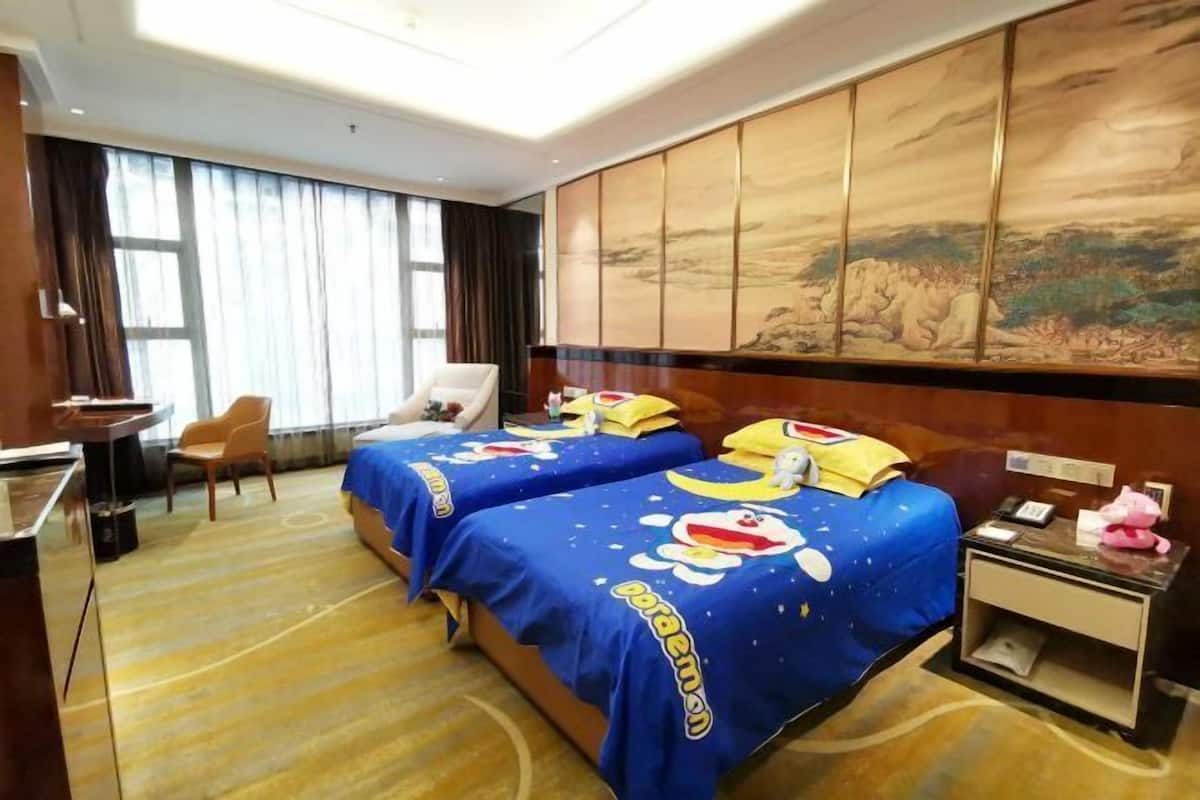 Minibar, safe på rommet, strykejern/-brett og internett