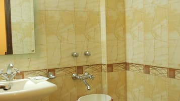 Combined shower/bathtub, hair dryer, bathrobes, slippers