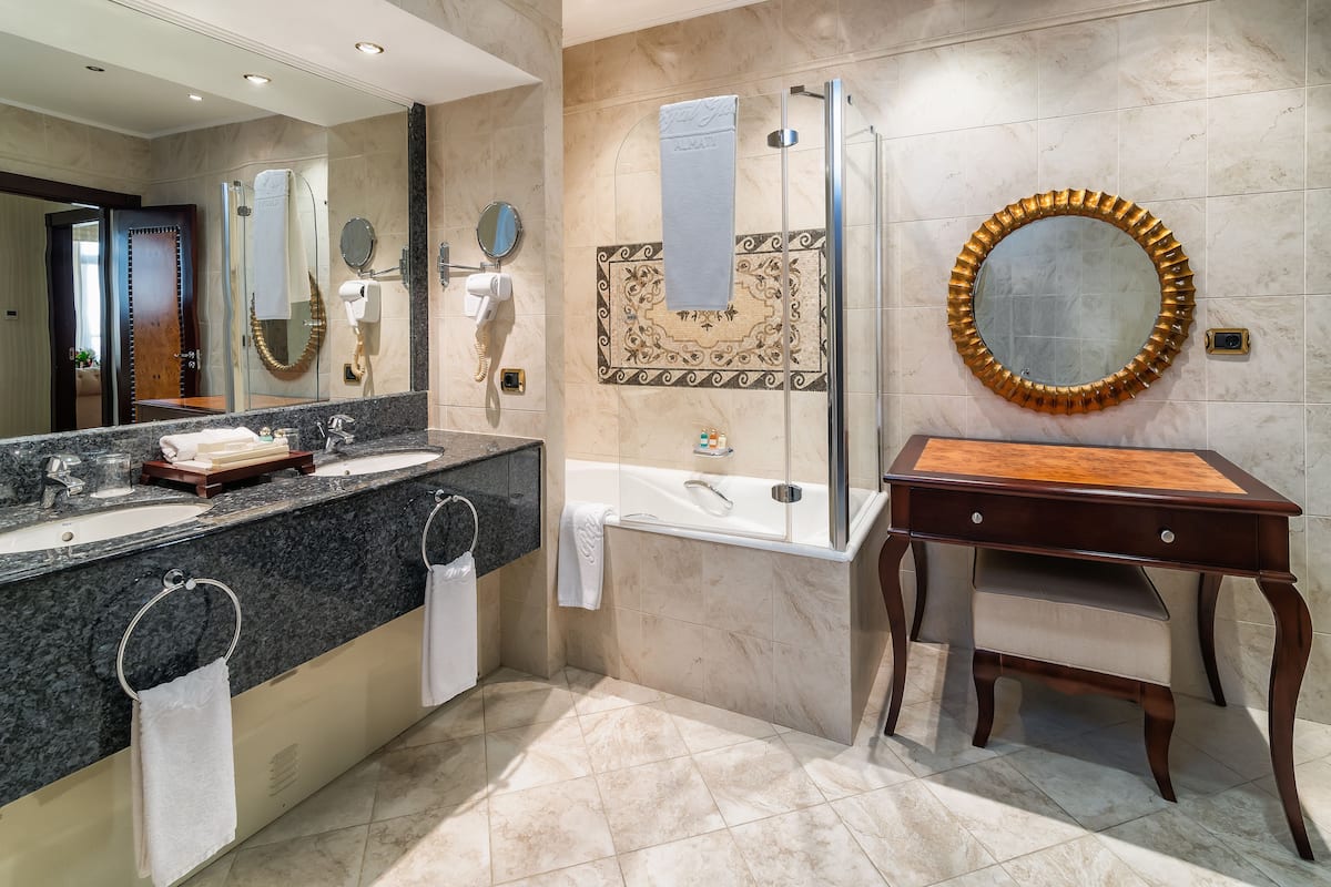 superior room, 1 king bed, terrace, city view | bathroom | combined shower/bathtub, rainfall showerhead, eco-friendly toiletries