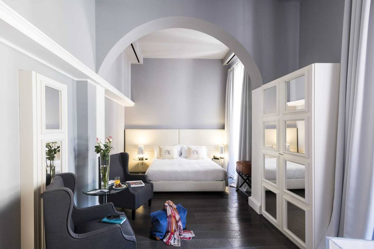 Premium bedding, down comforters, minibar, in-room safe