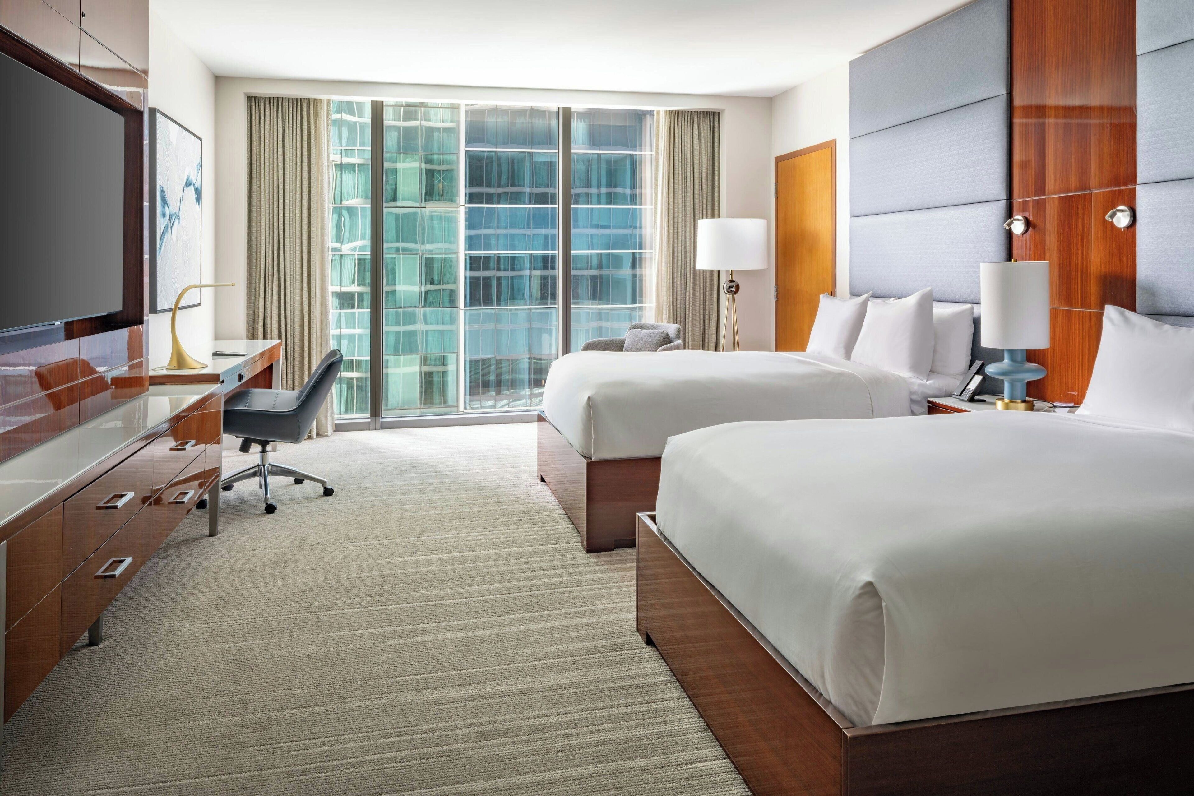 Premium bedding, down comforters, minibar, in-room safe