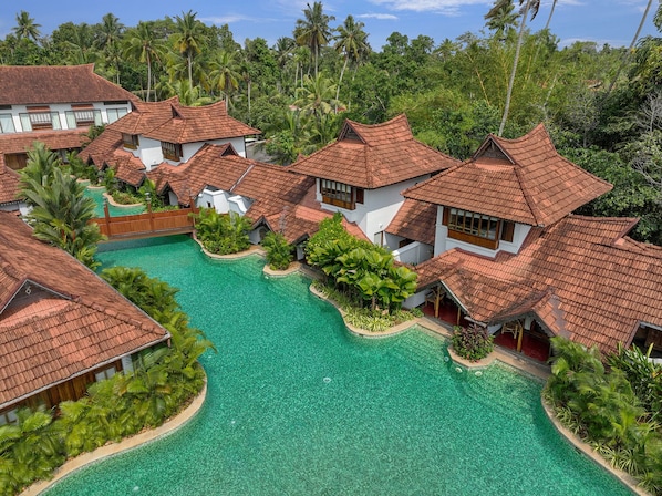 Habitación Deluxe, 1 cama King size (Meandering Pool Villa) | Ropa de cama de alta calidad y minibar