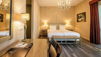 Royal Suite | Desk, blackout drapes, iron/ironing board, bed sheets