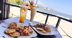 Breakfast, lunch, dinner served; beach views