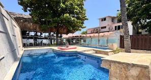 Outdoor pool, pool umbrellas, pool loungers