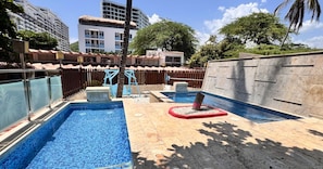 Outdoor pool, pool umbrellas, pool loungers