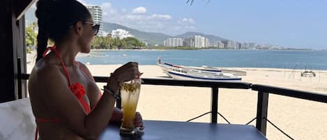 Breakfast, lunch, dinner served; beach views