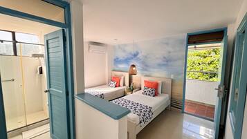 Deluxe Room | 1 bedroom, desk, blackout drapes, iron/ironing board