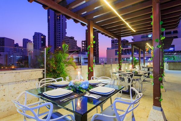 Breakfast, lunch, dinner served; garden views