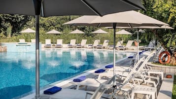 Indoor pool, seasonal outdoor pool, pool umbrellas, pool loungers