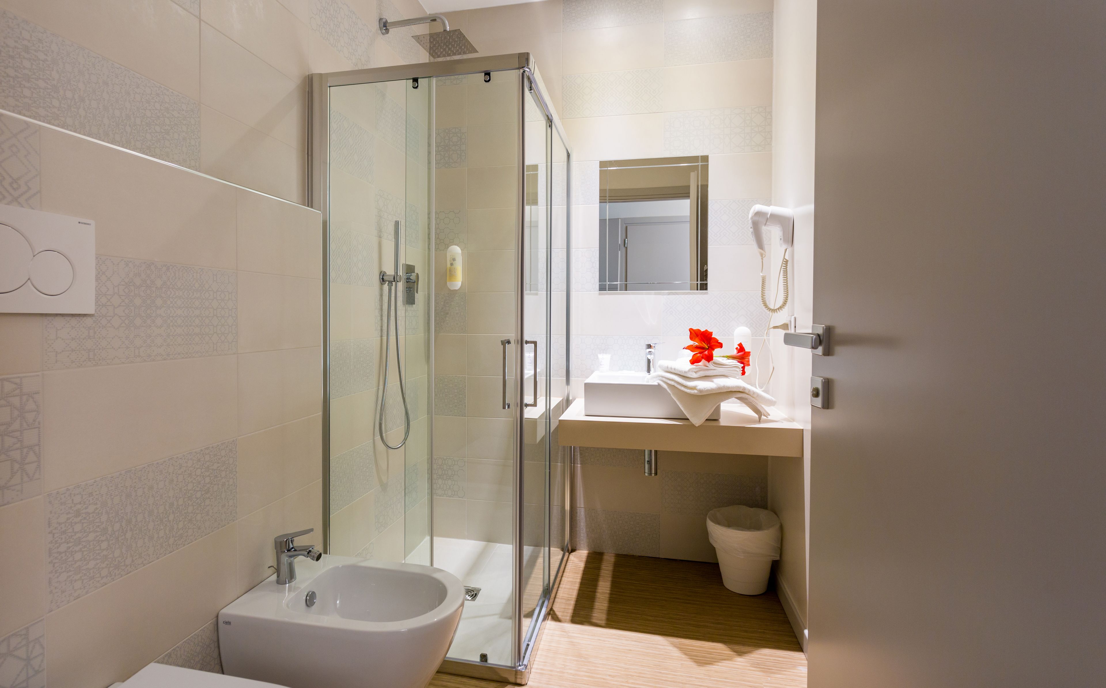 standard double room | bathroom | shower, rainfall showerhead, free toiletries, hair dryer
