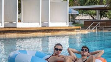 Indoor pool, outdoor pool, pool umbrellas, pool loungers