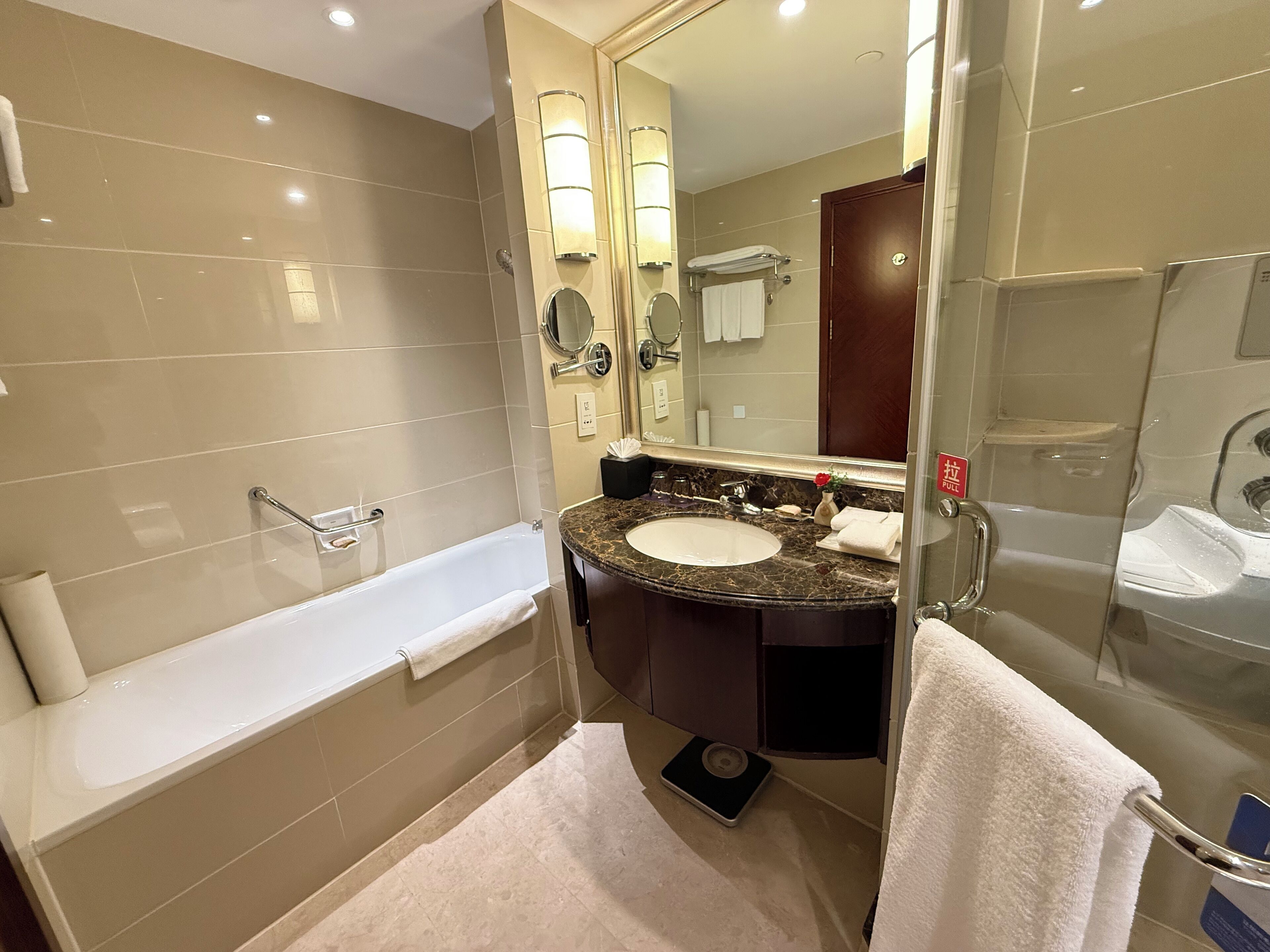 separate bathtub and shower, deep-soaking bathtub, rainfall showerhead