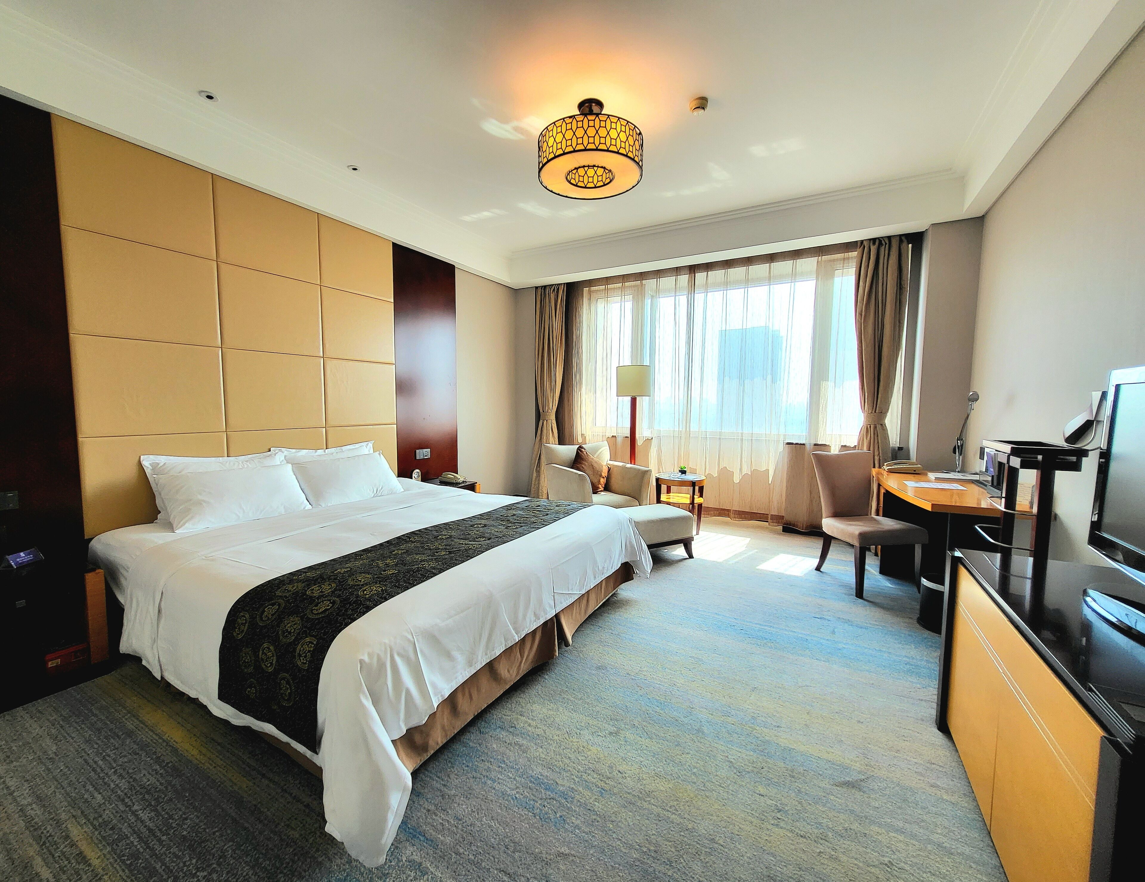 business king room | premium bedding, down duvets, pillow-top beds, minibar
